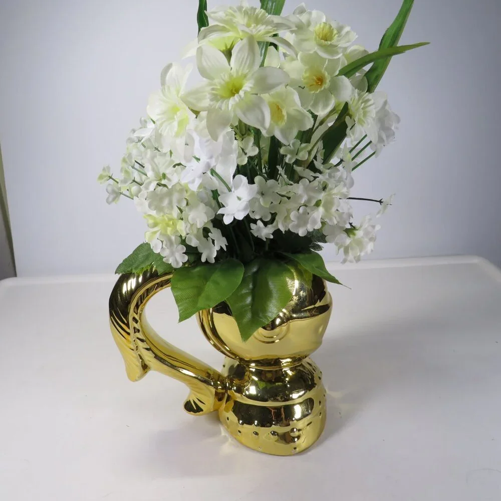 Gold Knight in Shining Armor with White Flowers